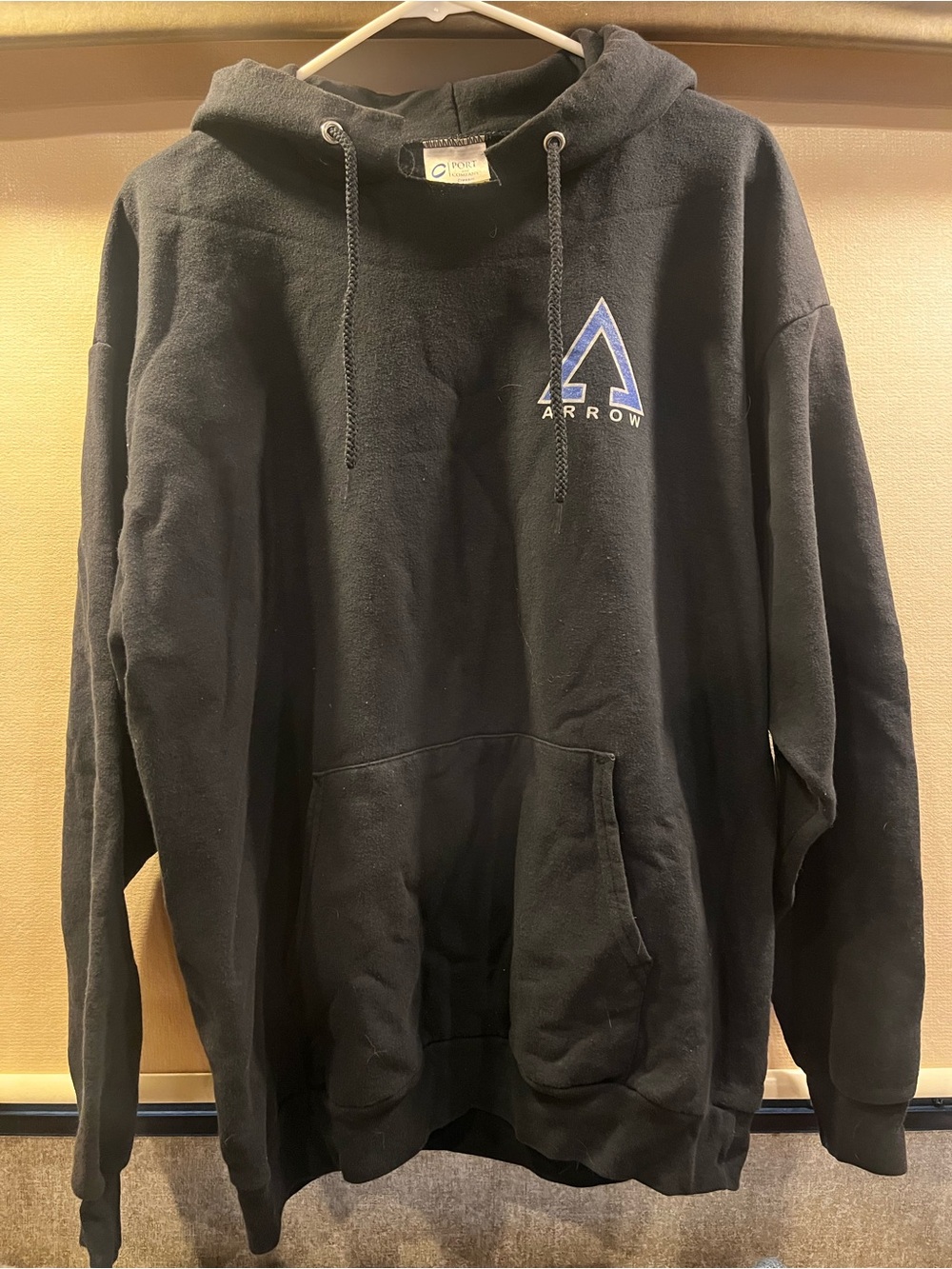 Port and Company Black Hooded Sweatshirt with Blue Arrow Logo